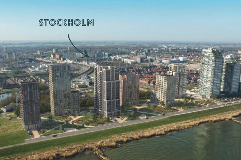 Impressie woontorens aan de Oude Maas met gebouw Stockholm
